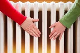 Soluciones Energéticas y Reformas, S.L. personas con manos en calefacción